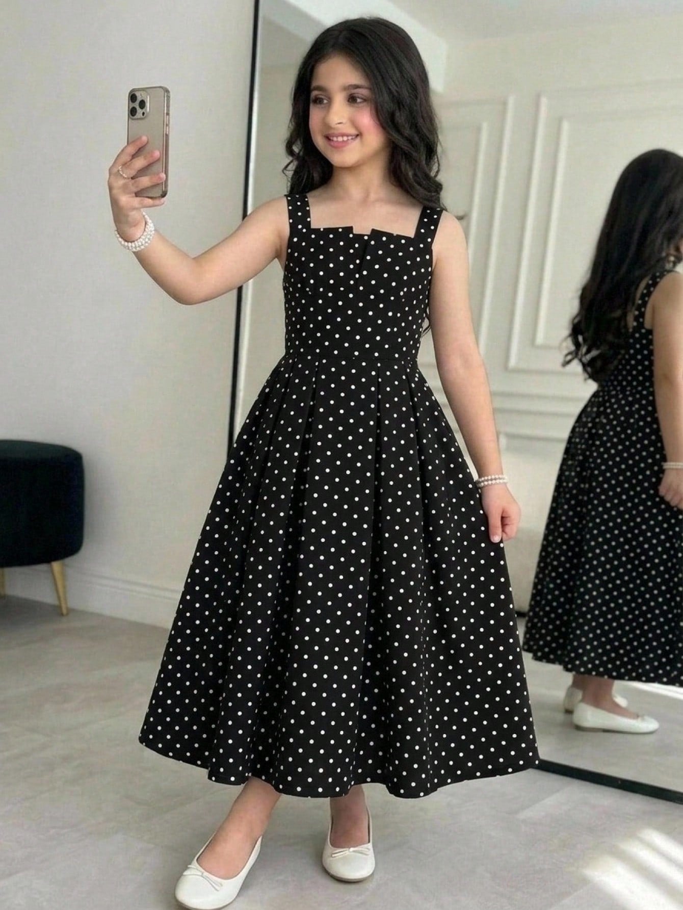 Tween girl apricot floral print midi dress with ruffle shoulder straps, shirred detail, and high waist A-line fit.