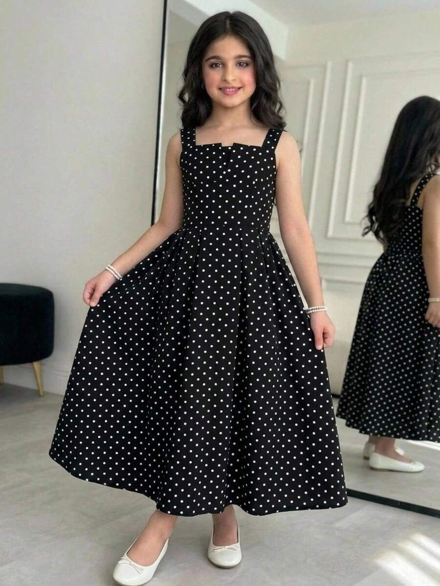 Tween girl apricot floral print midi dress with ruffle shoulder straps, shirred detail, and high waist A-line fit.
