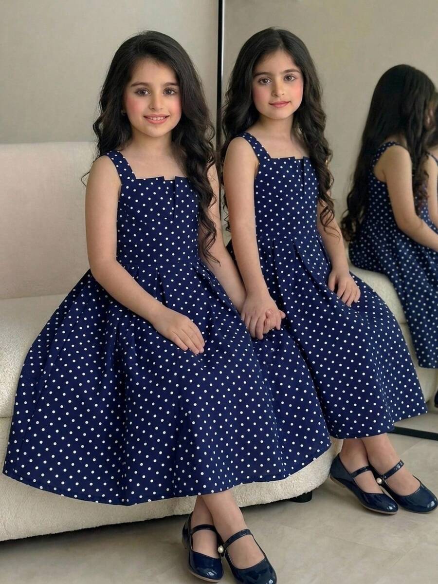 Tween girl apricot floral print midi dress with ruffle shoulder straps, shirred detail, and high waist A-line fit.