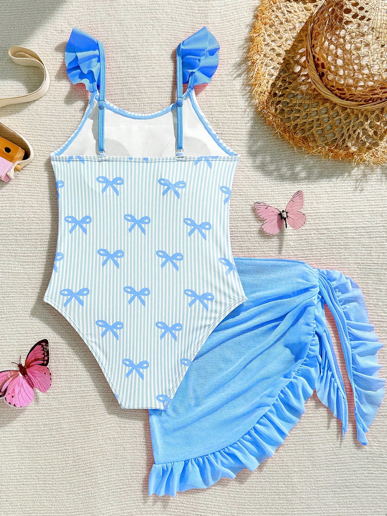 Tween girls one-piece swimsuit in leopard print with ruffle shoulder straps, scoop neckline, fitted shape, and attached ruffle hem skirt; sleeveless, mid-waist skirt bottom, and lined body for swimming, vacation, and summer beach wear.