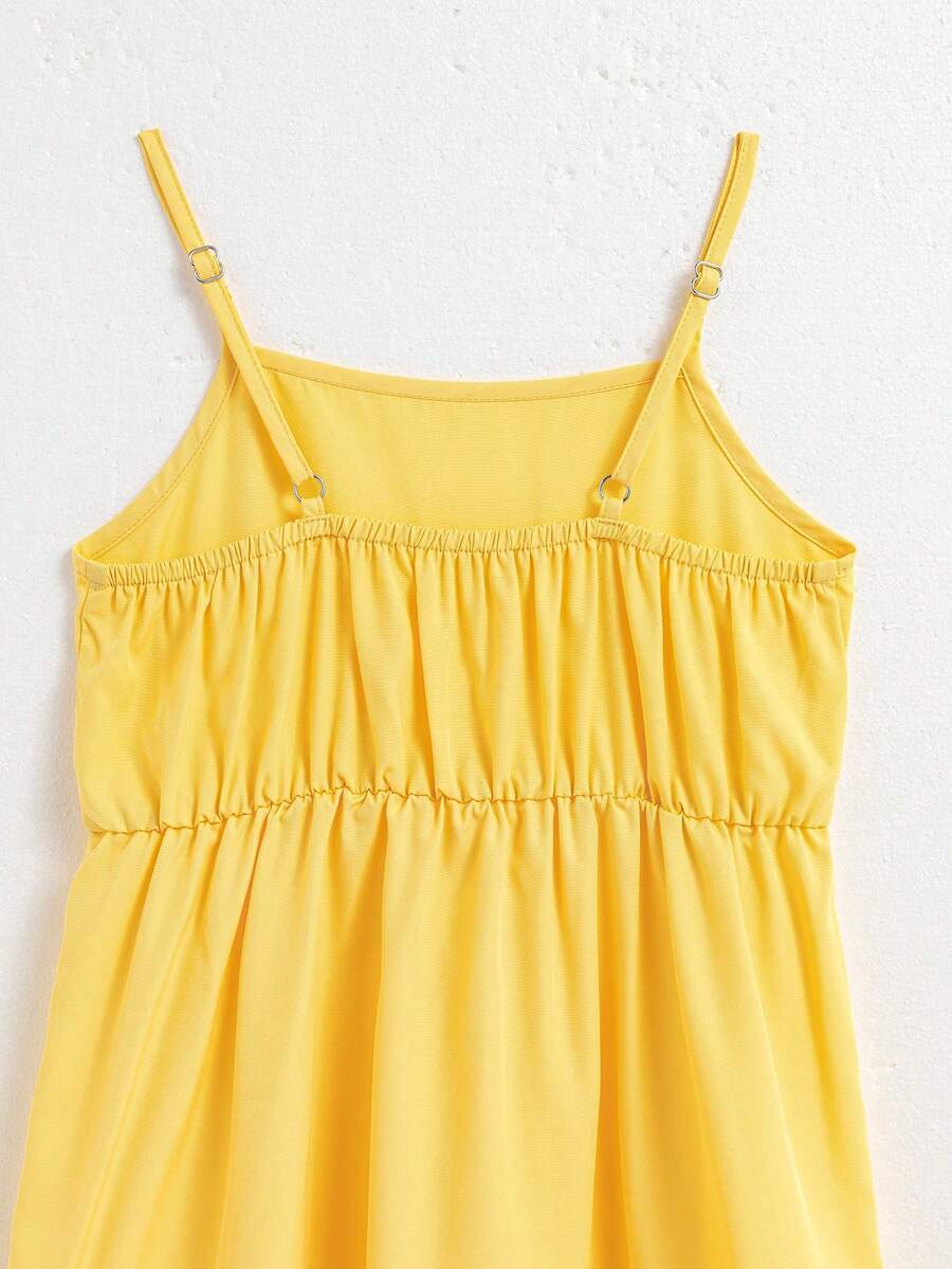 Tween girl blue plant print spaghetti strap cami dress with shirred high waist and flounce ruffled hem