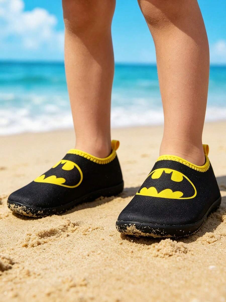 Girls cartoon pattern non-slip water shoes with slip-on closure and durable TPR outsole for beach and outdoor sports.