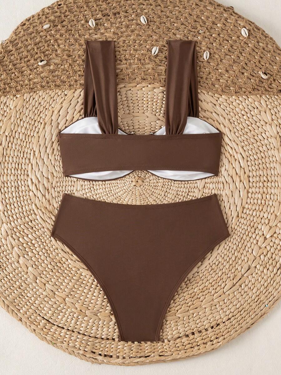 Springbreak black high waist bikini set for women featuring wireless bra top with ruffle lettuce trim and V-wired detail.