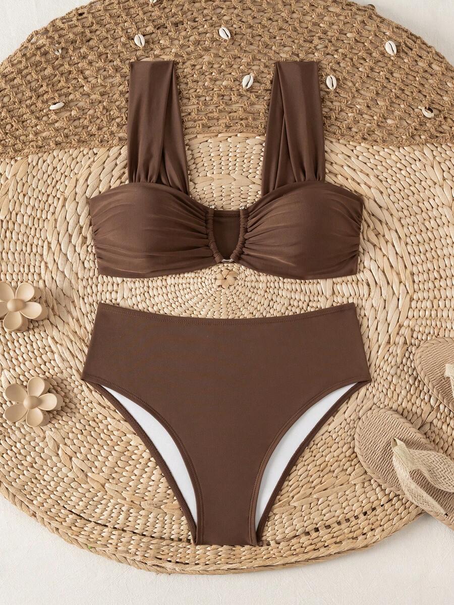 Springbreak black high waist bikini set for women featuring wireless bra top with ruffle lettuce trim and V-wired detail.