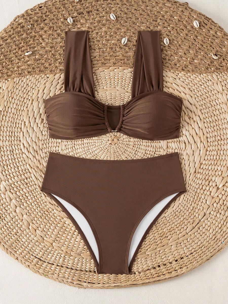 Springbreak black high waist bikini set for women featuring wireless bra top with ruffle lettuce trim and V-wired detail.