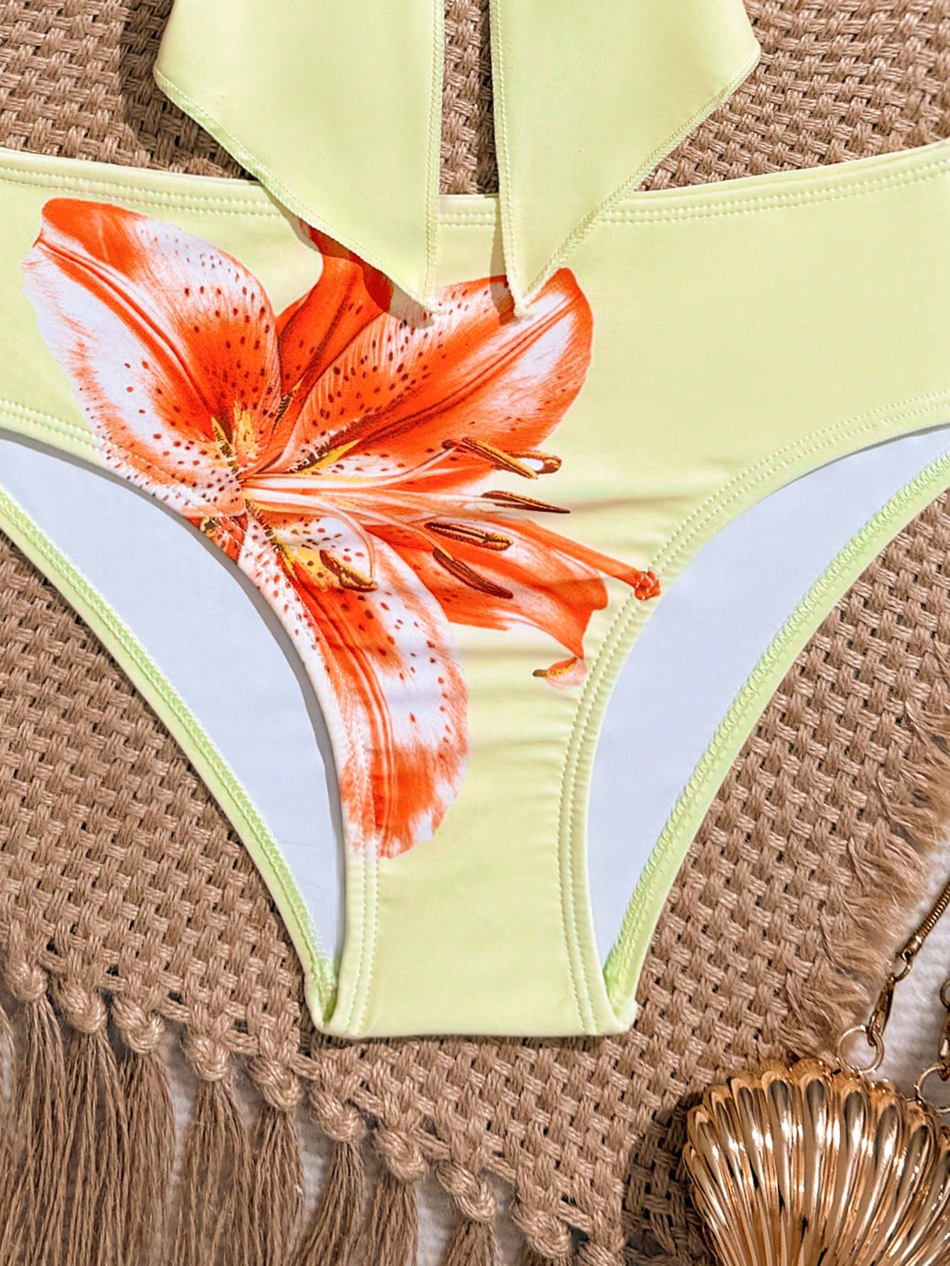 Tween girls two-piece tankini swimwear set with spaghetti straps, asymmetrical design, and 3D rose detail. Features a plant-pattern top and mid-waist bottoms in stretchy fabric for beach or pool wear.