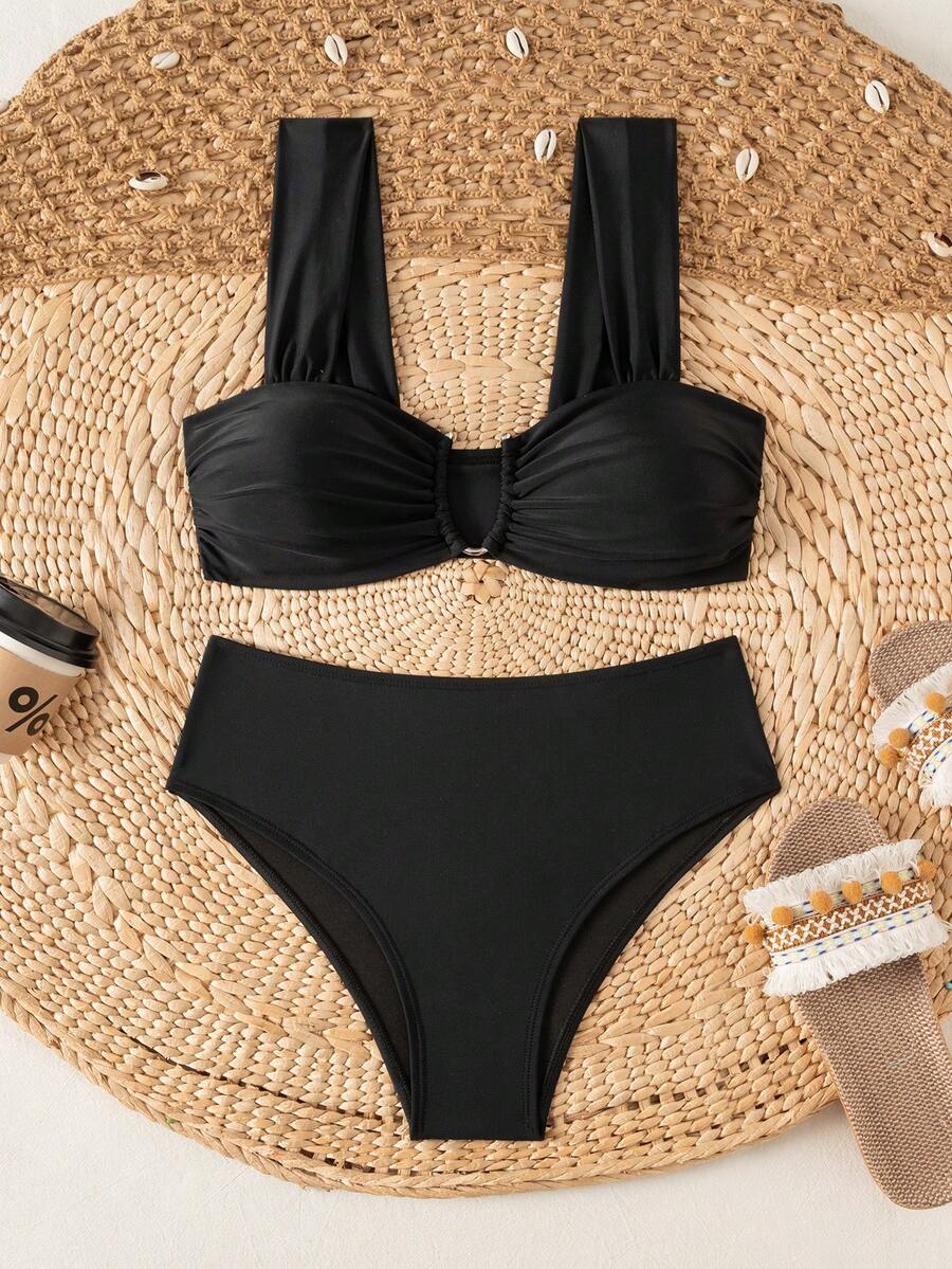 Springbreak black high waist bikini set for women featuring wireless bra top with ruffle lettuce trim and V-wired detail.