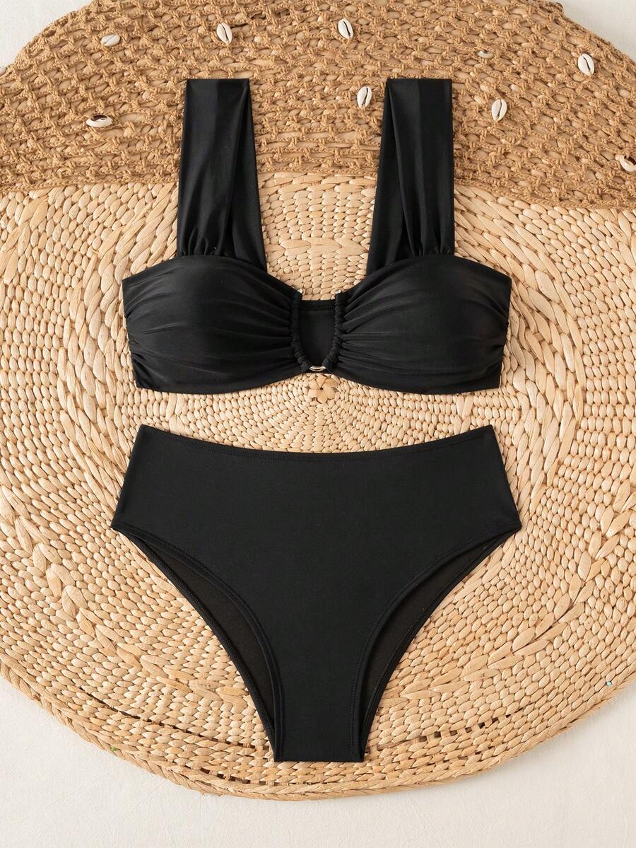 Springbreak black high waist bikini set for women featuring wireless bra top with ruffle lettuce trim and V-wired detail.