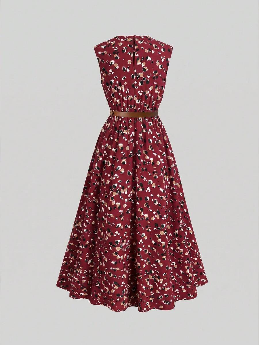 Tween girl wearing an apricot plant print sleeveless A-line long dress with a round neckline and flared skirt.