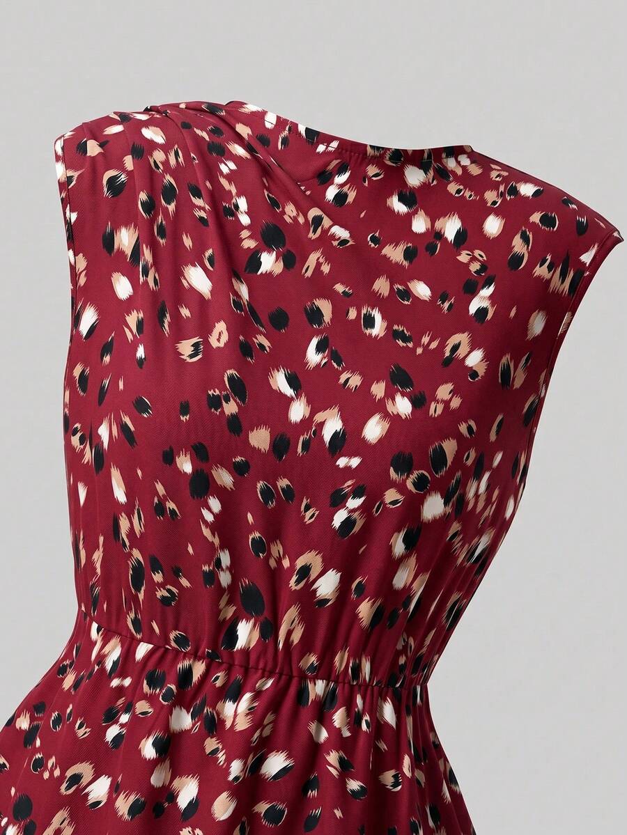 Tween girl wearing an apricot plant print sleeveless A-line long dress with a round neckline and flared skirt.