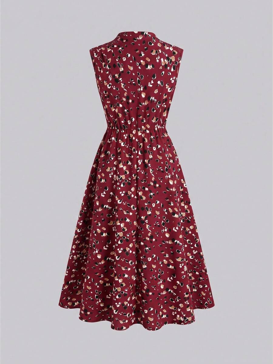 Tween girl wearing an apricot plant print sleeveless A-line long dress with a round neckline and flared skirt.
