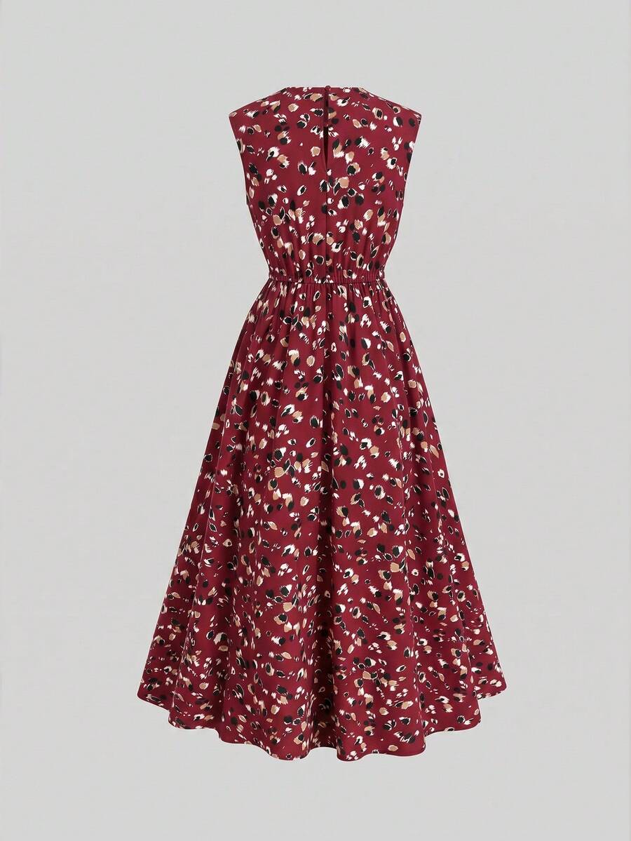 Tween girl wearing an apricot plant print sleeveless A-line long dress with a round neckline and flared skirt.