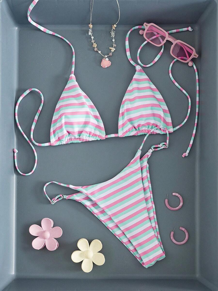 Women's printed halter neck tie two-piece swimwear featuring a wireless triangle top with removable padding and high-waist high-cut bikini bottoms.