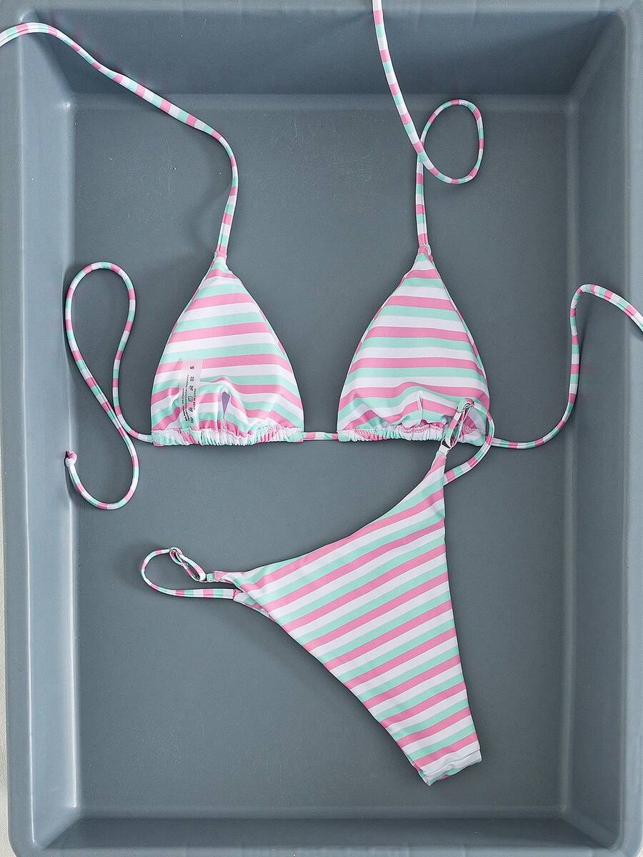 Women's printed halter neck tie two-piece swimwear featuring a wireless triangle top with removable padding and high-waist high-cut bikini bottoms.