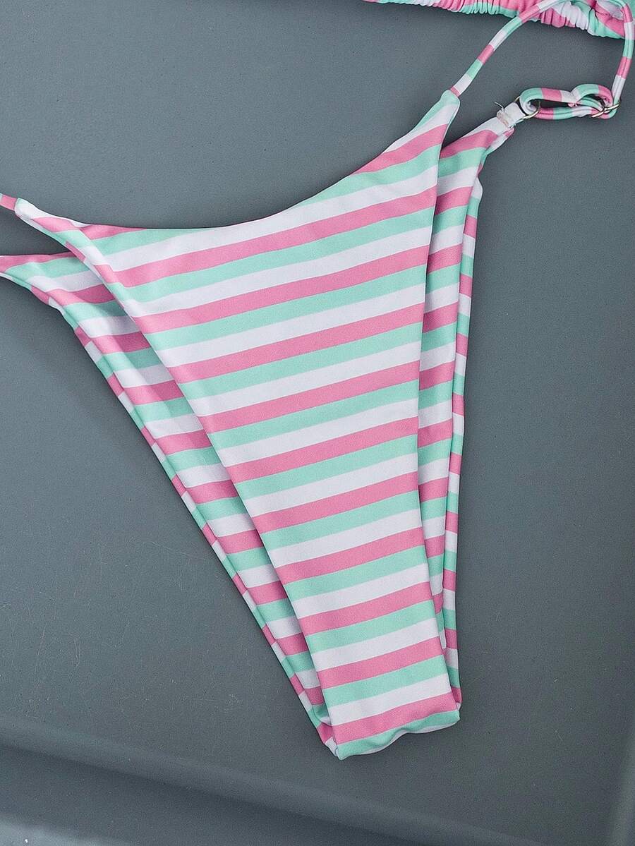 Women's printed halter neck tie two-piece swimwear featuring a wireless triangle top with removable padding and high-waist high-cut bikini bottoms.