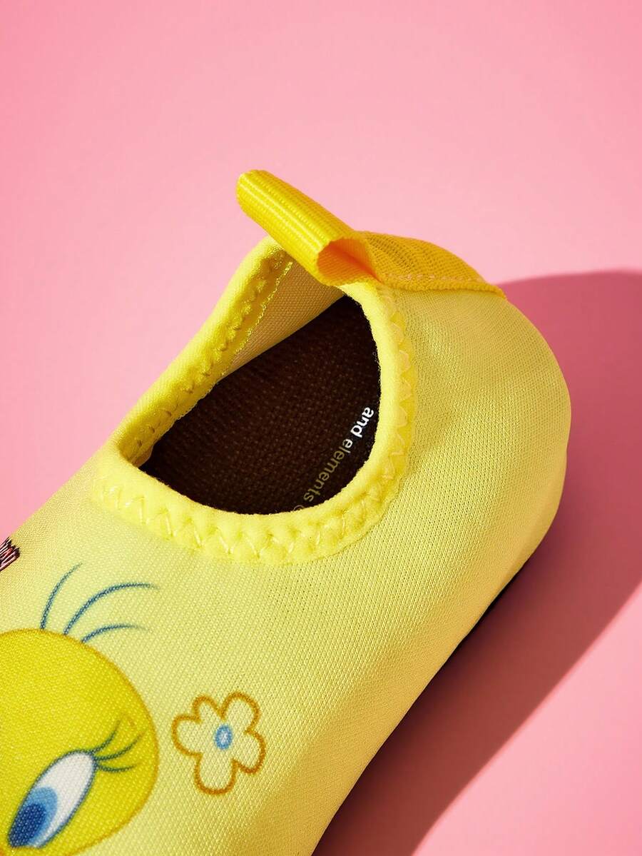 Girls cartoon pattern non-slip water shoes with slip-on closure and durable TPR outsole for beach and outdoor sports.