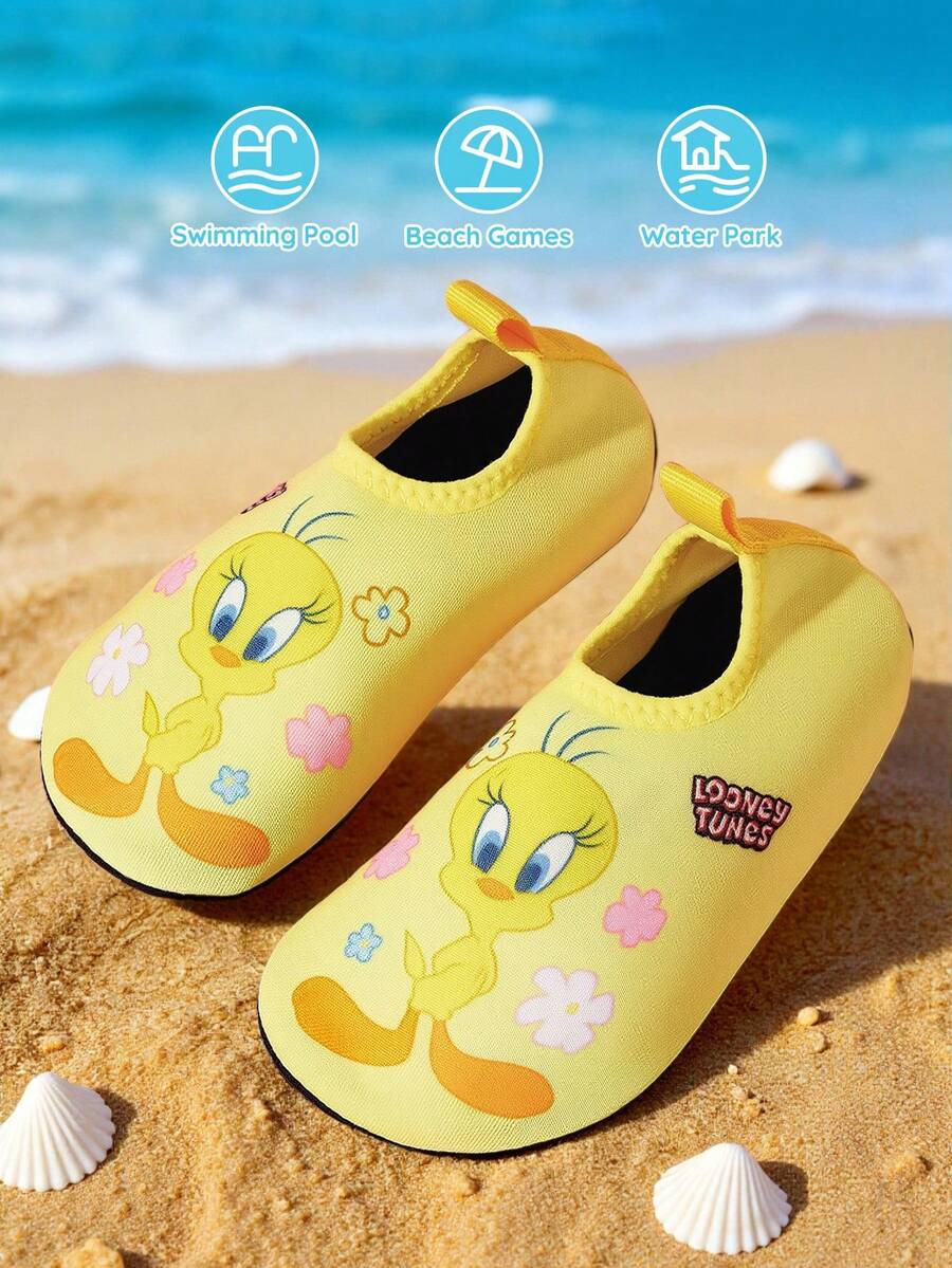 Girls cartoon pattern non-slip water shoes with slip-on closure and durable TPR outsole for beach and outdoor sports.