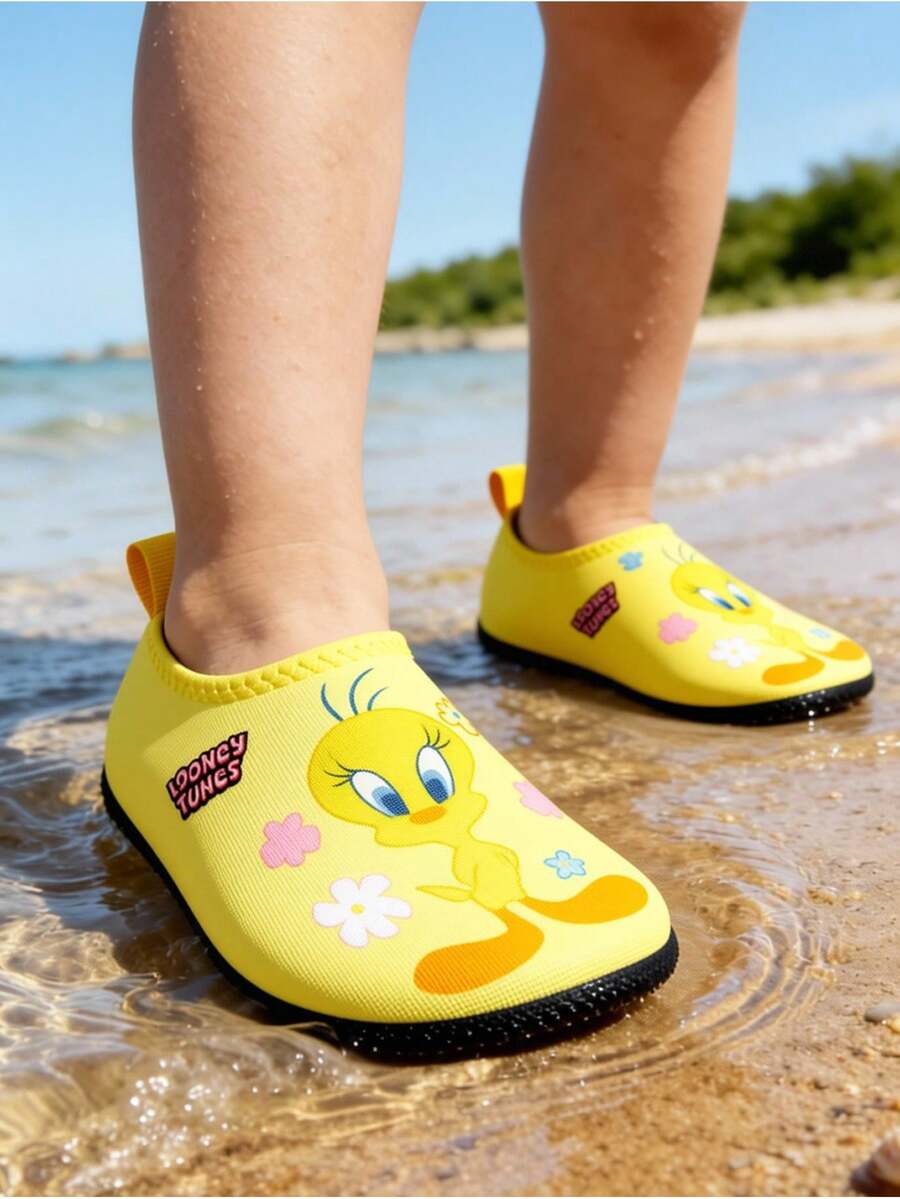 Girls cartoon pattern non-slip water shoes with slip-on closure and durable TPR outsole for beach and outdoor sports.