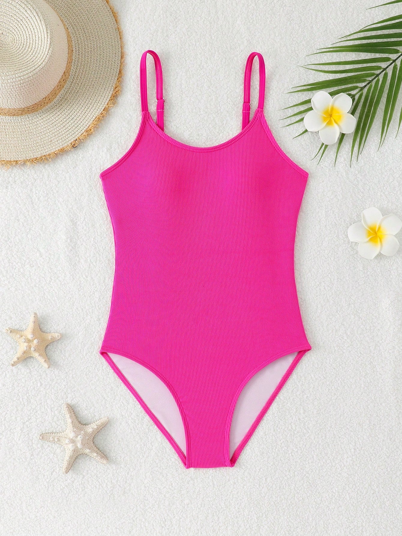 White tween girls one-piece swimsuit with V-neck, cutout detail, appliques, plant pattern, mid-waist bottom, and lined body for beach or swimming