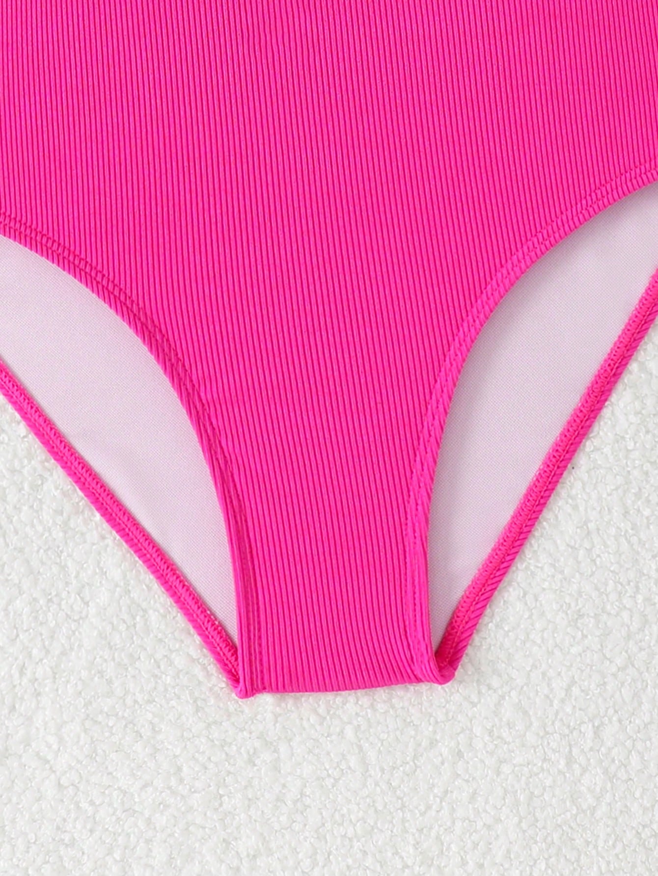 White tween girls one-piece swimsuit with V-neck, cutout detail, appliques, plant pattern, mid-waist bottom, and lined body for beach or swimming