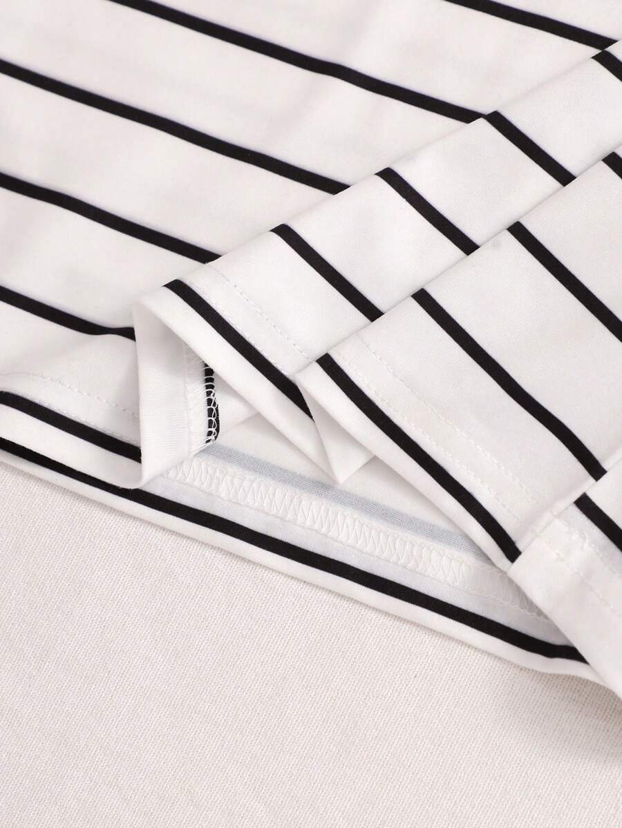 Girls black striped midi dress featuring short sleeves, round neck, slim fit, and flared hem.