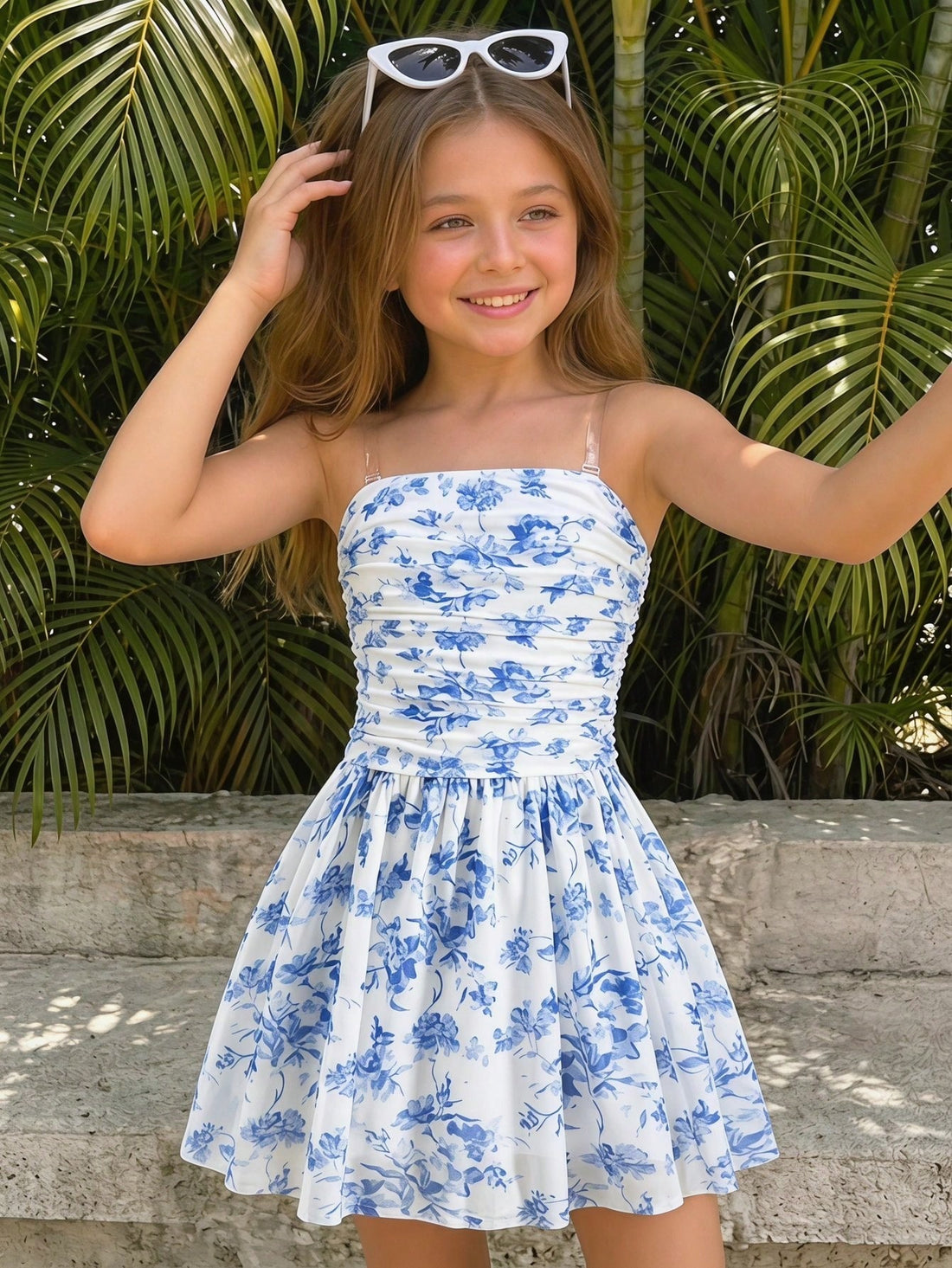Blue floral strapless tube dress for tween girls with ruched bust, shirred detail, zipper closure, high waist, flared hem, and slim fit.