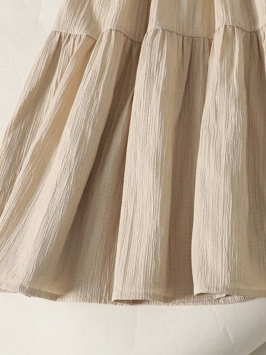 Apricot striped tween girl midi dress with flounce short sleeves, round neckline, high-waist belt, and layered ruffle hem.