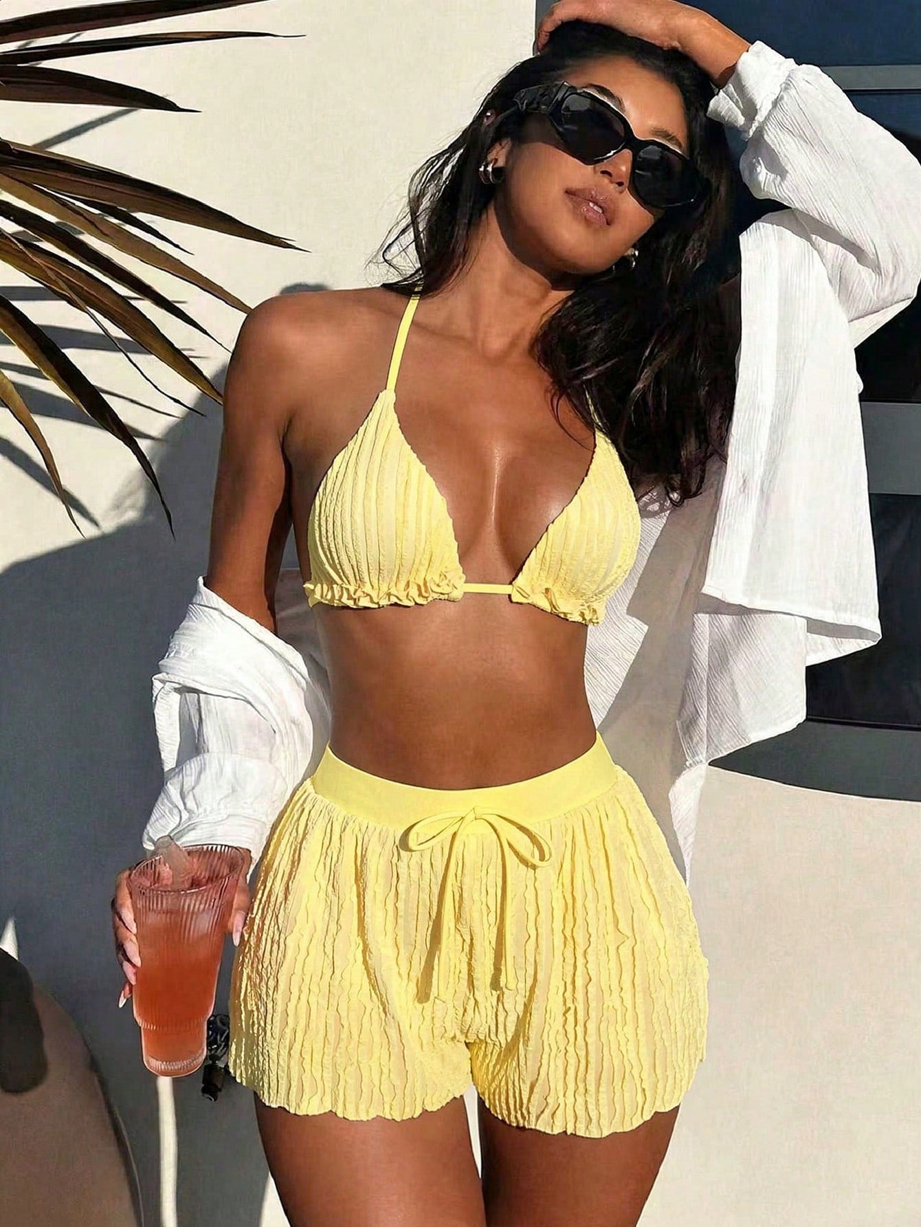 Women's 3-piece frill trim bikini set with halter tie-back top and high waist bottoms.
