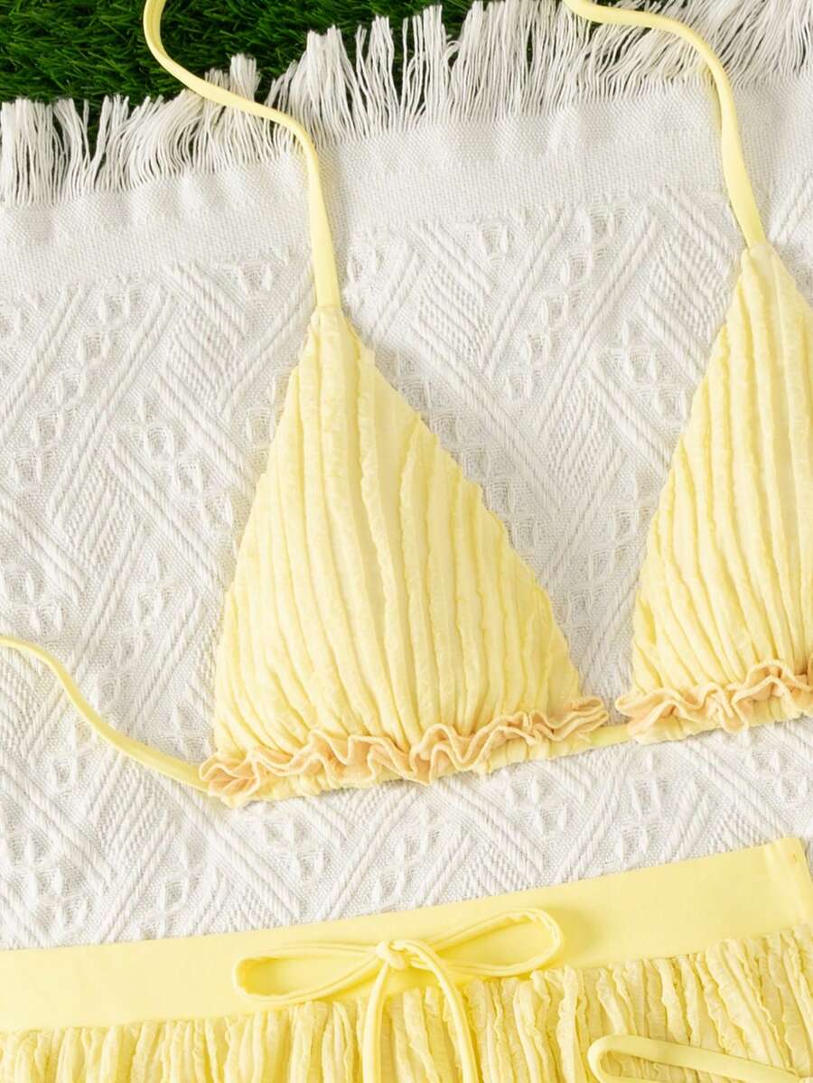 Women's 3-piece frill trim bikini set with halter tie-back top and high waist bottoms.