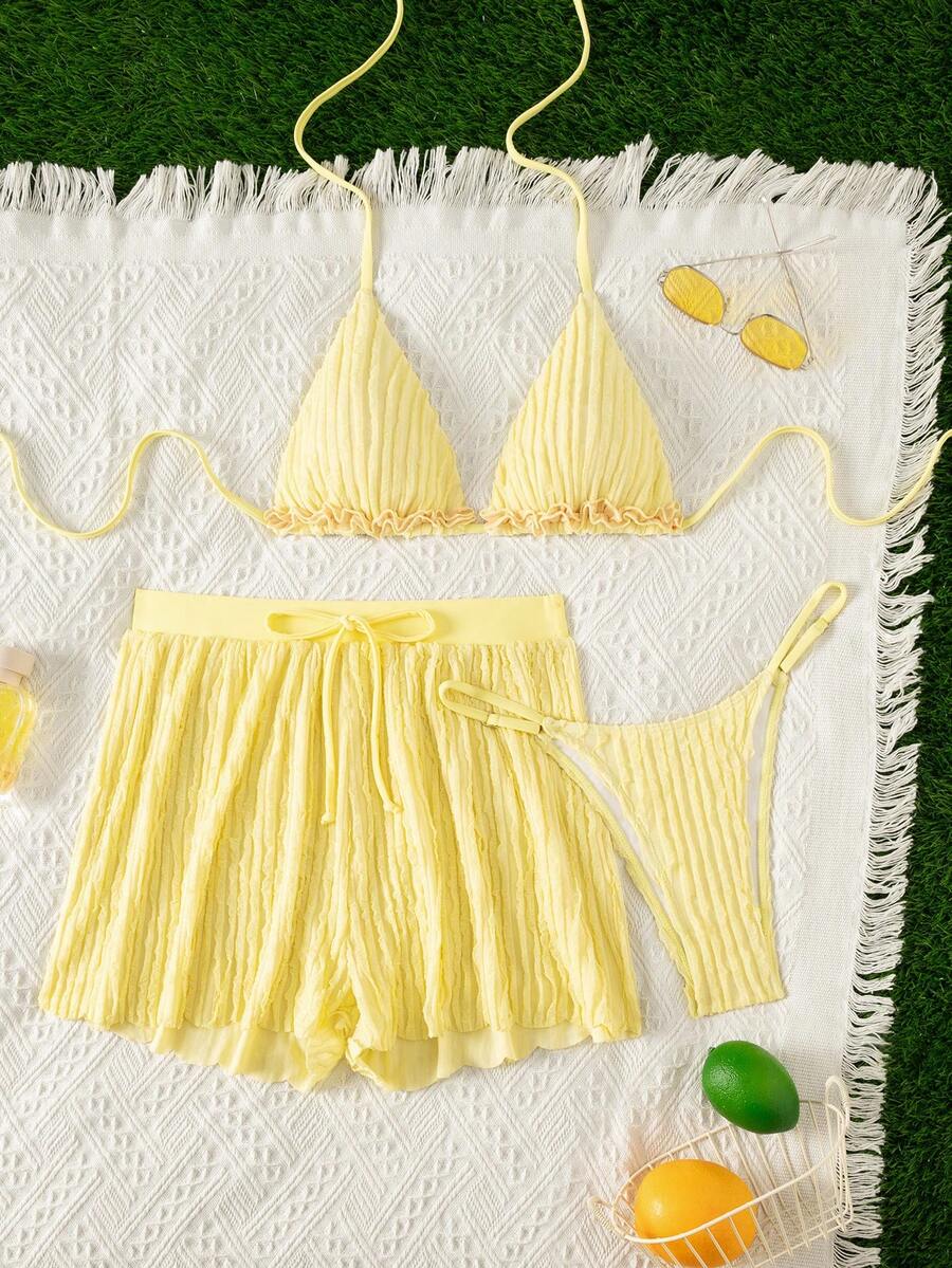 Women's 3-piece frill trim bikini set with halter tie-back top and high waist bottoms.