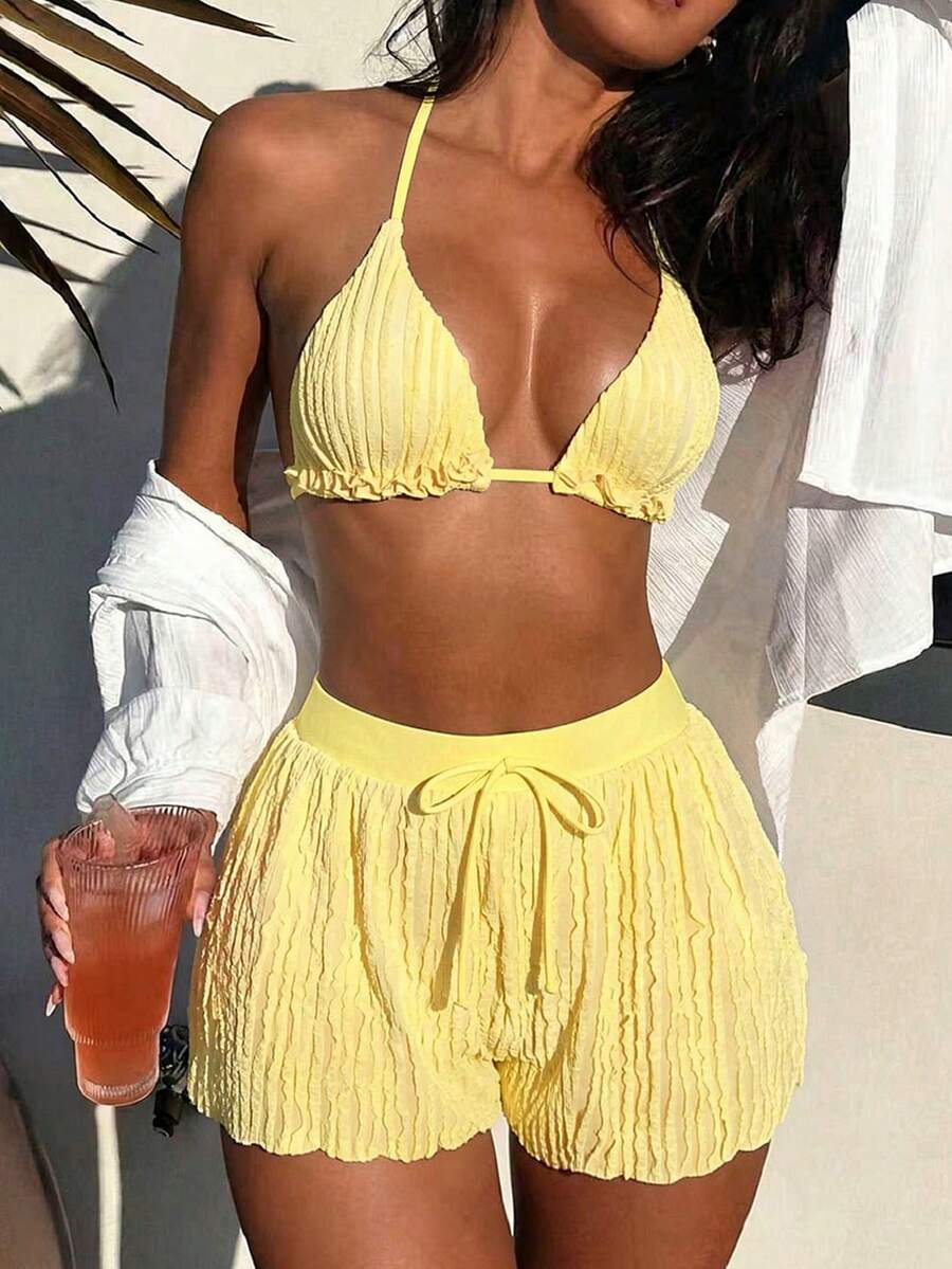 Women's 3-piece frill trim bikini set with halter tie-back top and high waist bottoms.