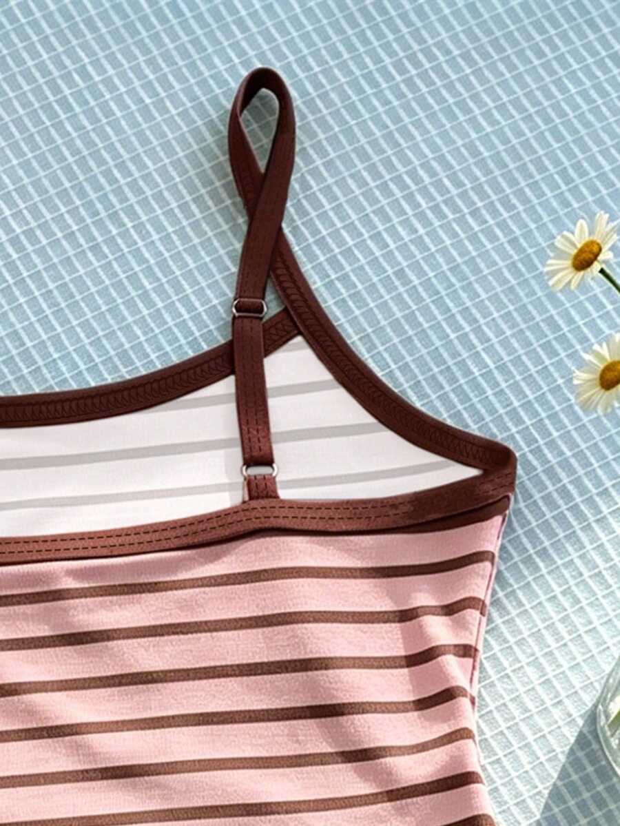Tween girls summer 2-piece Hawaiian style outfit featuring a graphic print spaghetti strap camisole top with contrast piping and matching casual shorts.