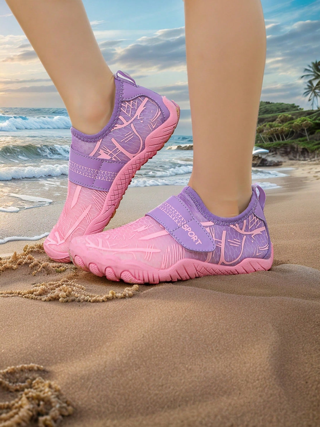 Baby pink girls' water shoes featuring breathable mesh uppers, hook-and-loop strap closure, and non-slip rubber soles.