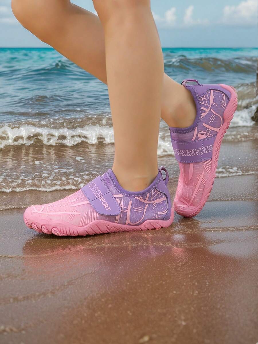 Baby pink girls' water shoes featuring breathable mesh uppers, hook-and-loop strap closure, and non-slip rubber soles.