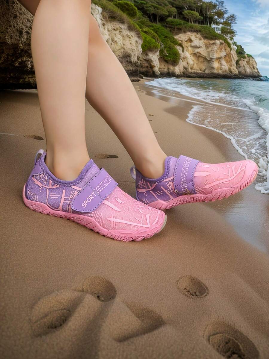 Baby pink girls' water shoes featuring breathable mesh uppers, hook-and-loop strap closure, and non-slip rubber soles.