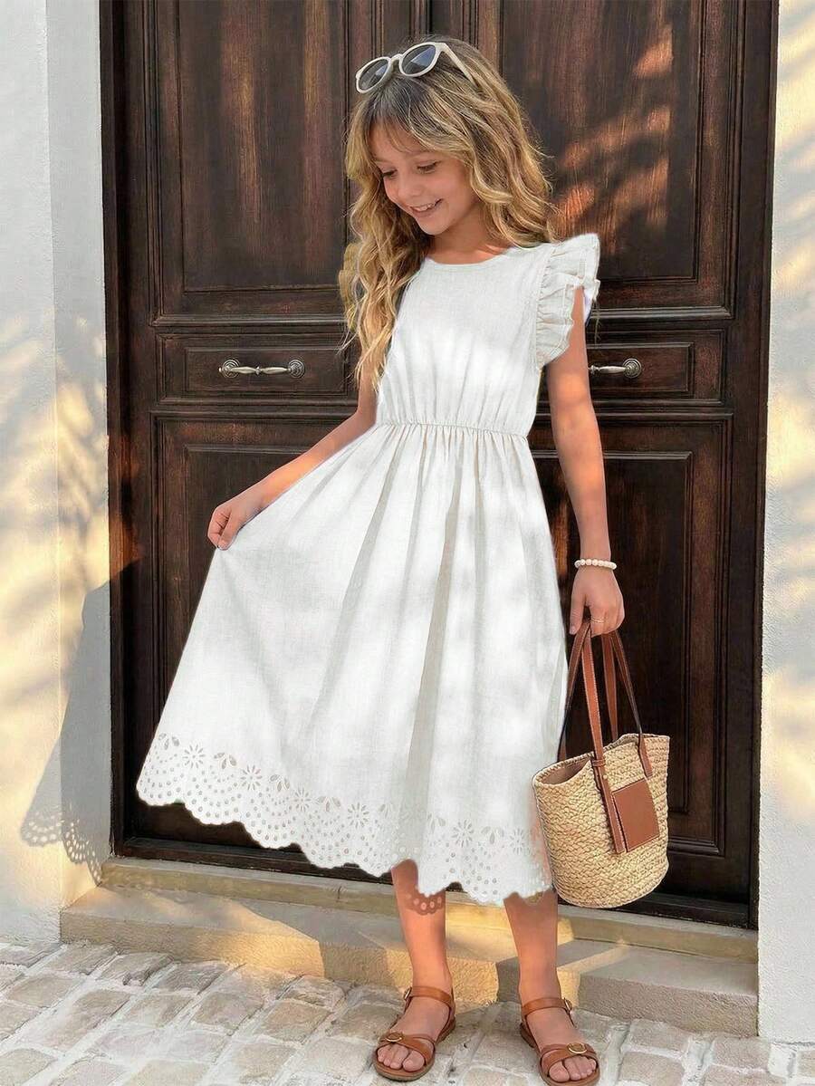 Tween girls dusty blue casual A-line dress with round neck, ruffle accents, high waist, and flared hem.