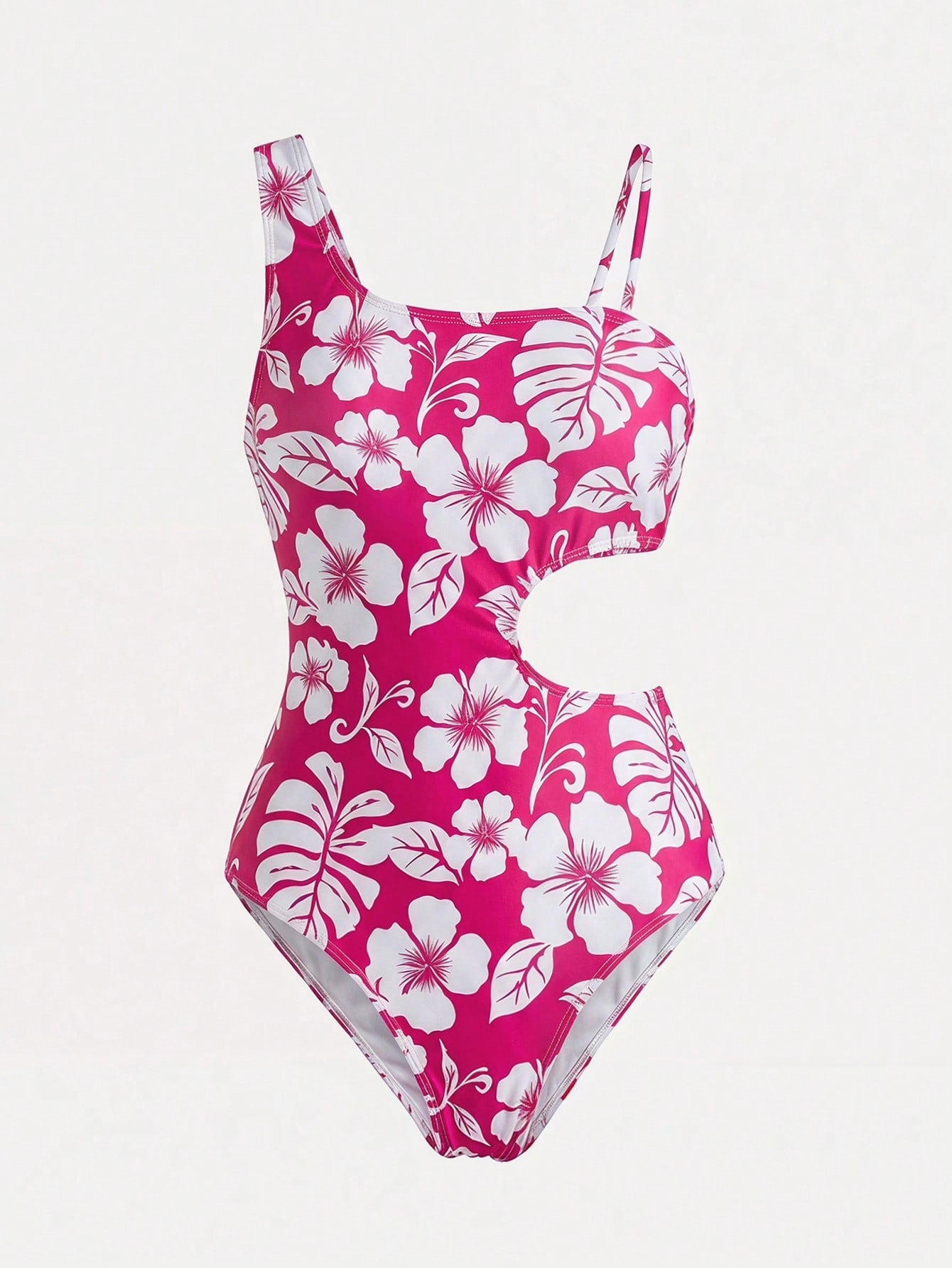 Tween girls' black and white one-piece swimsuit with striped patchwork design, scoop neck, asymmetrical cut-out detail, and fitted vacation swimwear style.