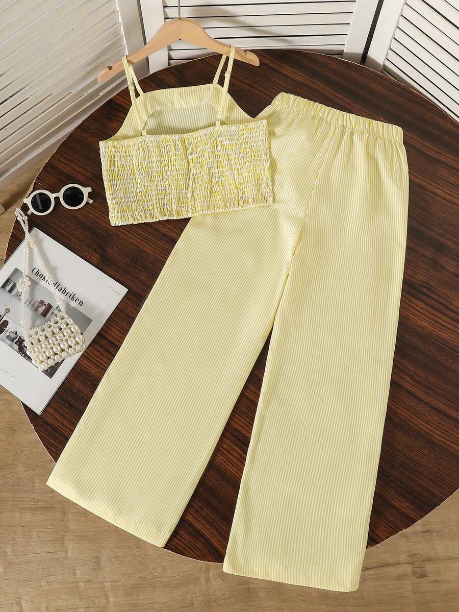 Tween girls casual 2-piece set featuring an apricot woven camisole crop top with back shirring and matching high-waisted loose long pants.