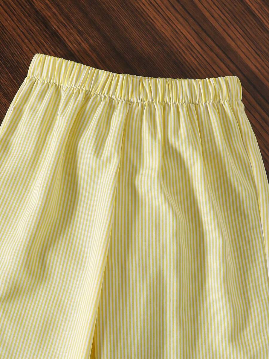 Tween girls casual 2-piece set featuring an apricot woven camisole crop top with back shirring and matching high-waisted loose long pants.