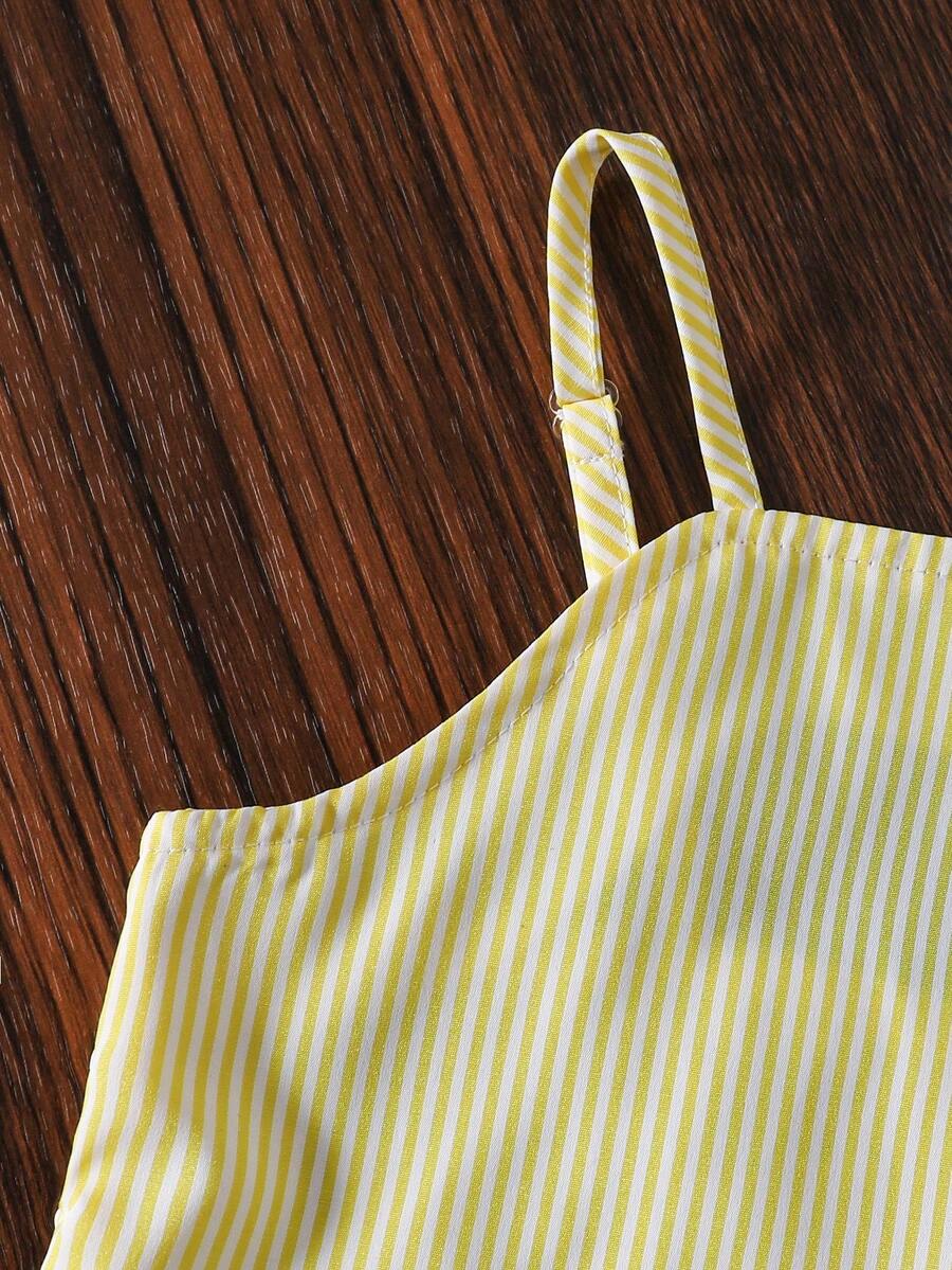 Tween girls casual 2-piece set featuring an apricot woven camisole crop top with back shirring and matching high-waisted loose long pants.