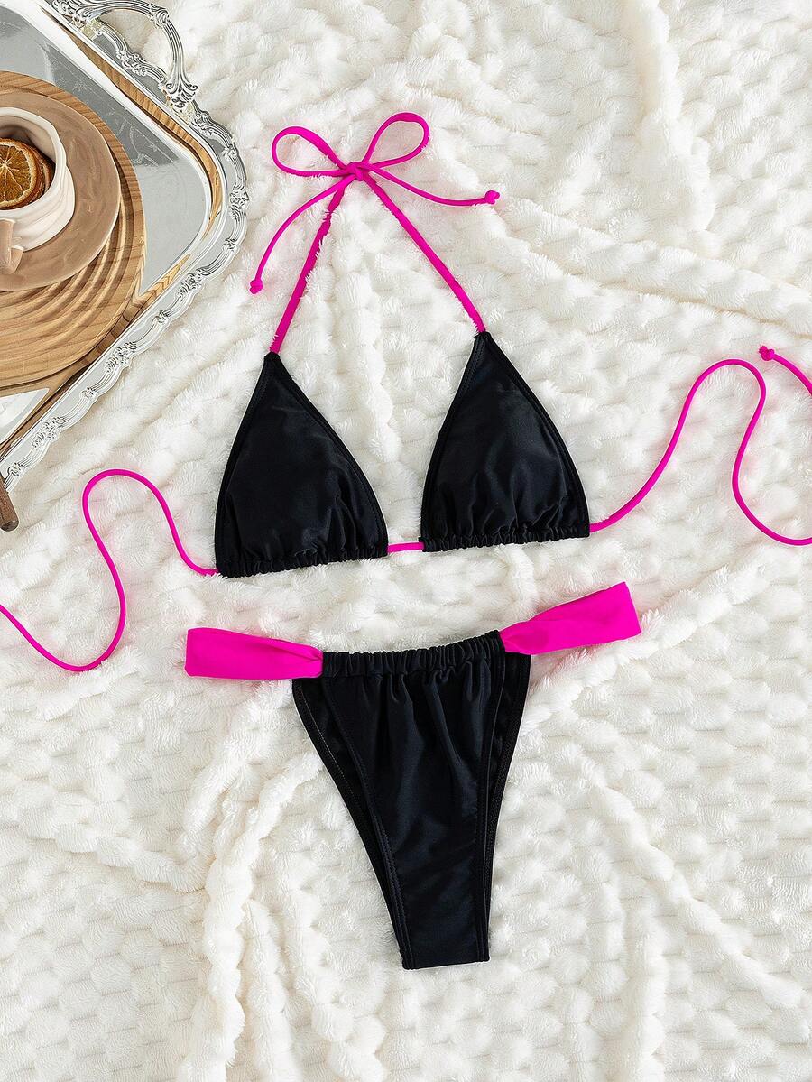 Women's striped halter two-piece swimsuit featuring a lace-up triangle top with removable padding and high-cut low-waist bikini bottoms.
