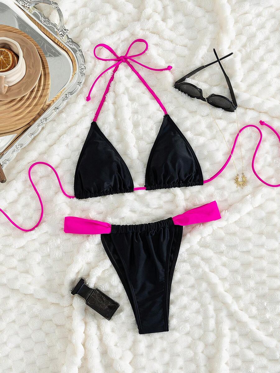 Women's striped halter two-piece swimsuit featuring a lace-up triangle top with removable padding and high-cut low-waist bikini bottoms.