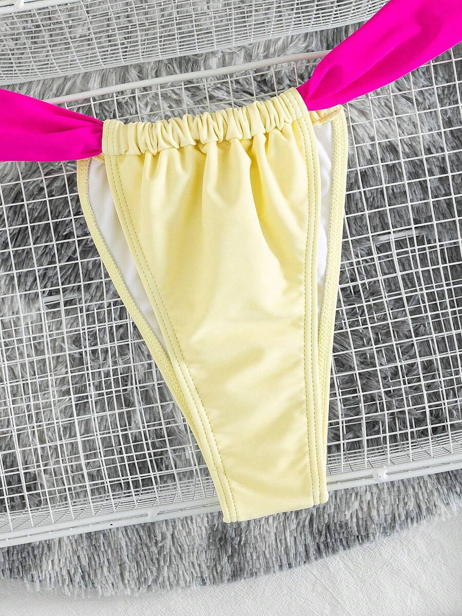 Women's striped halter two-piece swimsuit featuring a lace-up triangle top with removable padding and high-cut low-waist bikini bottoms.