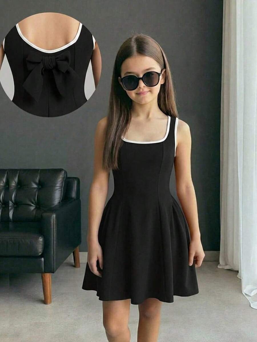 Apricot short-sleeve holiday party dress for tween girls featuring a square neckline, contrast lace details, high waist, flared A-line hem, and bowknot ruffle back detail.