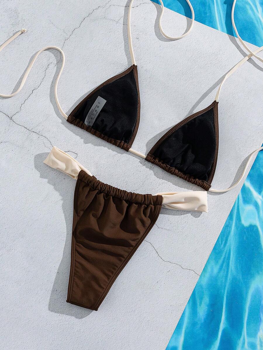 Women's striped halter two-piece swimsuit featuring a lace-up triangle top with removable padding and high-cut low-waist bikini bottoms.