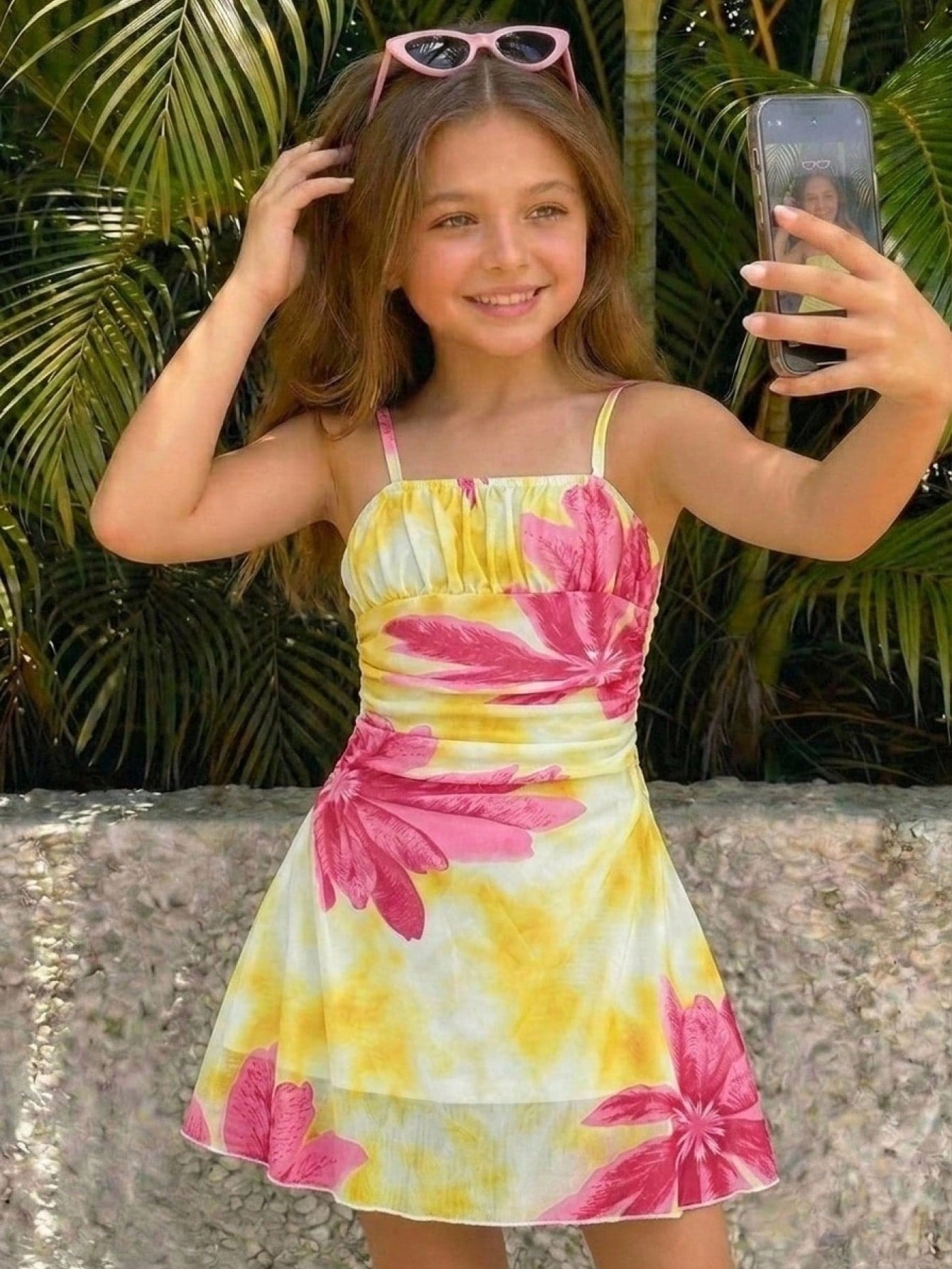 Apricot tween girls sleeveless halter cami dress with appliques, bow front, zipper detail, high waist, flared hem, and short slim fit design.
