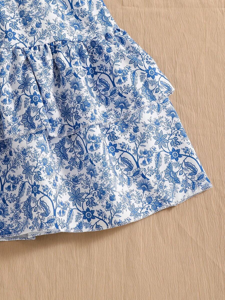 Light blue two-piece outfit set for tween girls with a sleeveless round neck vest top and a tiered ruffle cake skirt featuring a plant pattern.