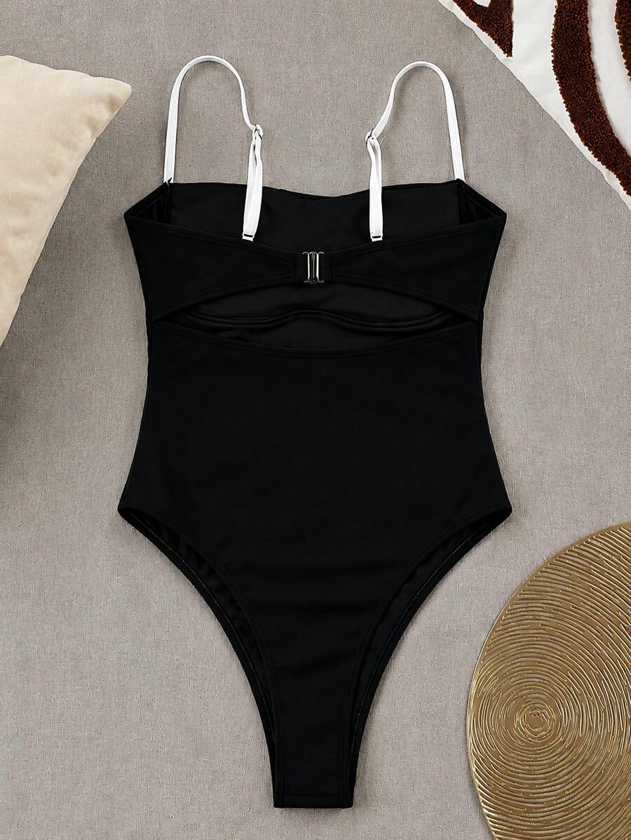 Black colorblock women's one-piece swimsuit with spaghetti straps and high stretch fabric.
