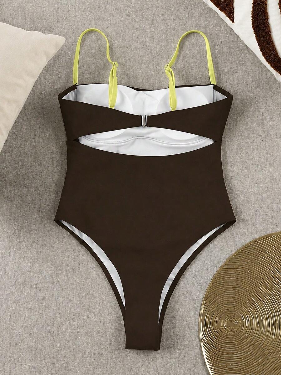Black colorblock women's one-piece swimsuit with spaghetti straps and high stretch fabric.