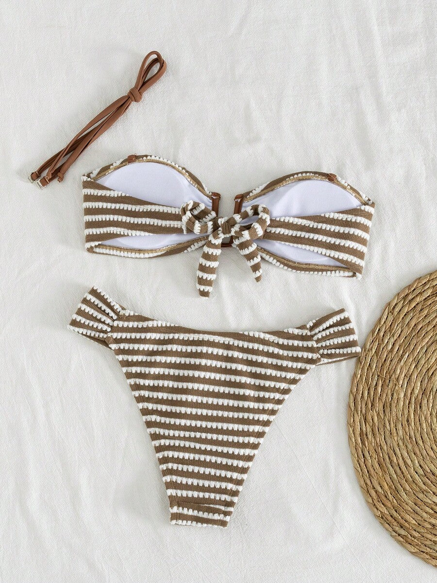 Brown and white small plaid two-piece bikini set featuring a strapless ruched bustier top with back tie and high-waist bottoms.